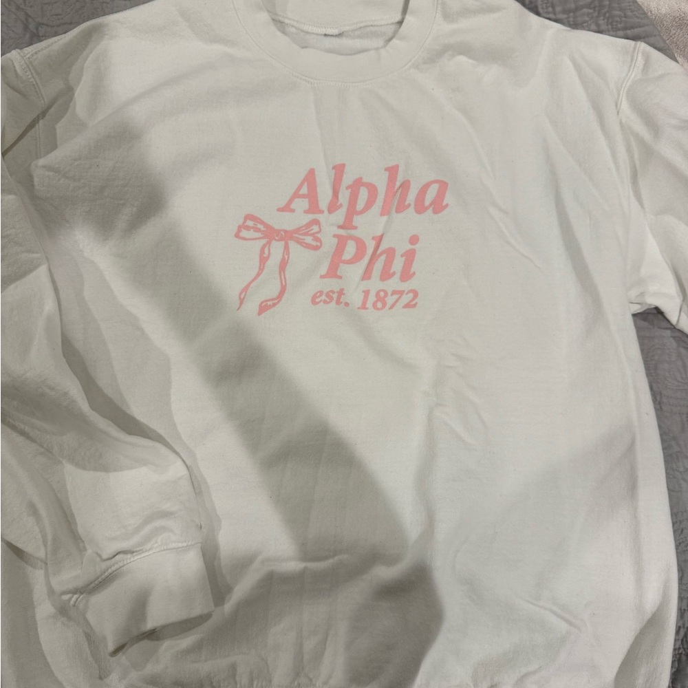 White Sweatshirt with Pink Alpha Phi Design